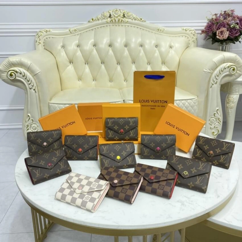 The compac Louis Vuitton Monogram Canvas Victorine Wallet Pink - Image 11